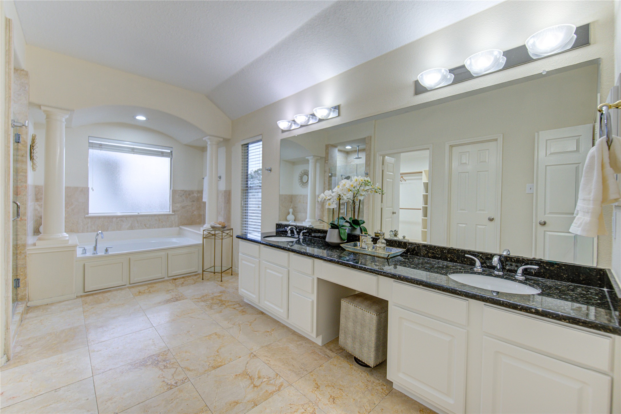 2327 Centerbrook Lane Katy, TX 77450 - Photo 37 of 47 a large bathroom with a double vanity sink and a mirror
