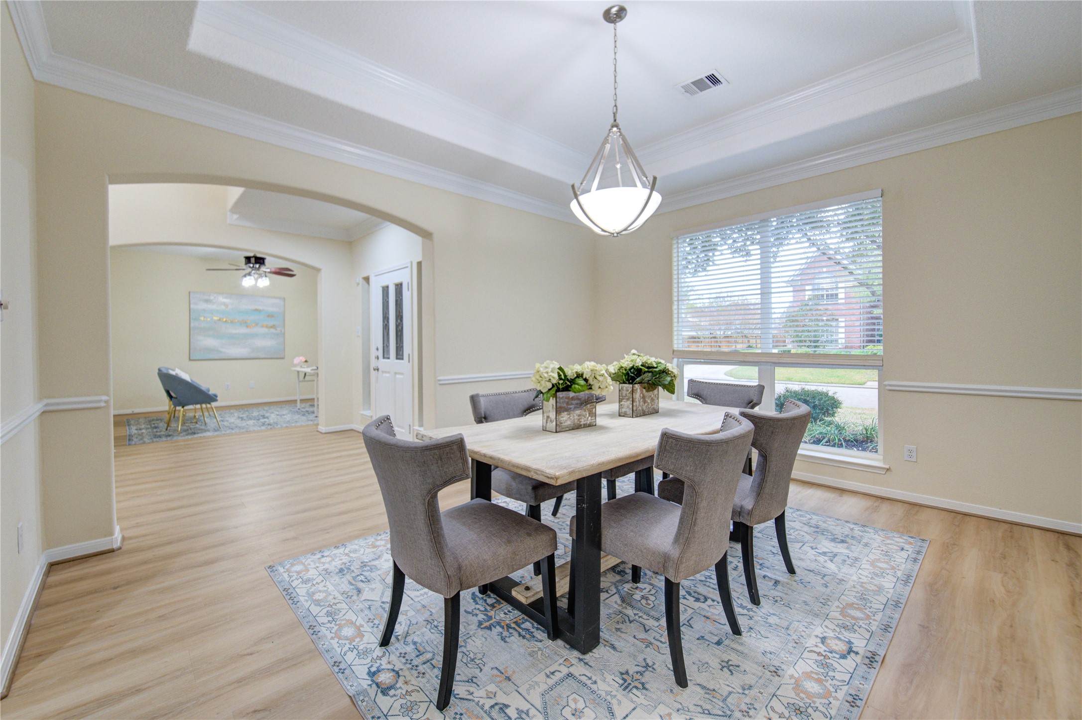 2327 Centerbrook Lane Katy, TX 77450 - Photo 8 of 47 a view of a dining room with furniture window and wooden floor