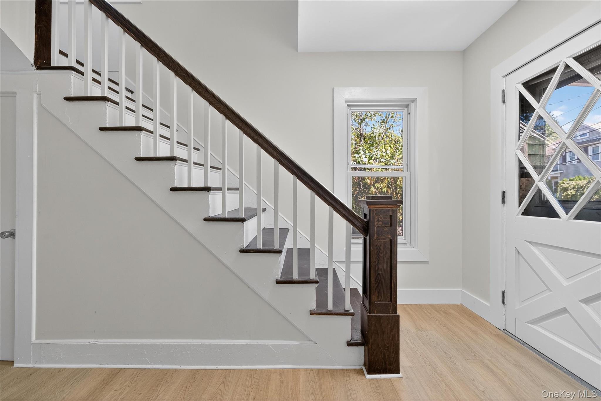 26 Ridge Street Middletown, NY 10940 - Photo 4 of 22 a view of entryway and hall with wooden floor