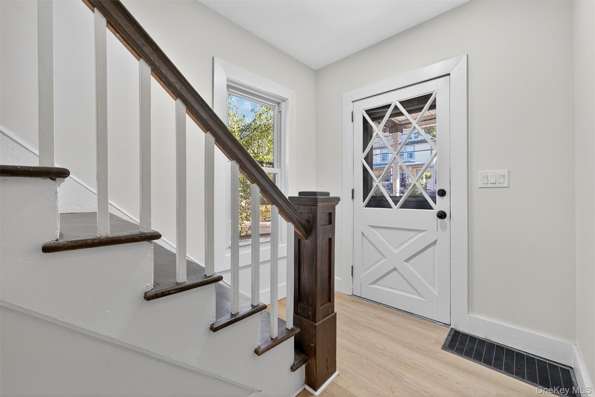 26 Ridge Street Middletown, NY 10940 - Photo 5 of 22 a view of entryway and hall with wooden floor