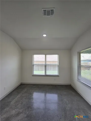 an empty room with a window