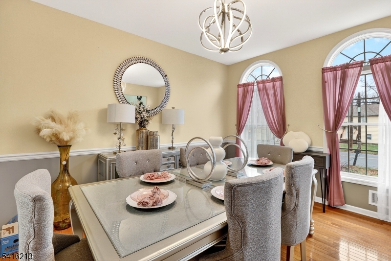 127 Churchill Avenue Somerset, NJ 08873 - Photo 12 of 33 a dining room with furniture and window