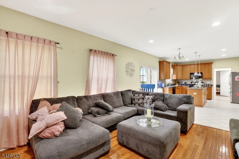 127 Churchill Avenue Somerset, NJ 08873 - Photo 16 of 33 a living room with furniture and kitchen view