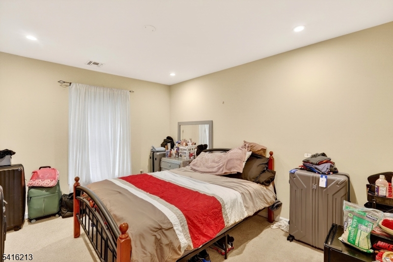 127 Churchill Avenue Somerset, NJ 08873 - Photo 28 of 33 a bedroom with a bed and a closet