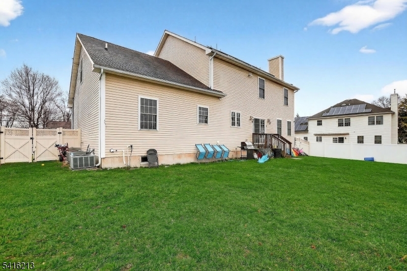127 Churchill Avenue Somerset, NJ 08873 - Photo 4 of 33 a view of a house with backyard