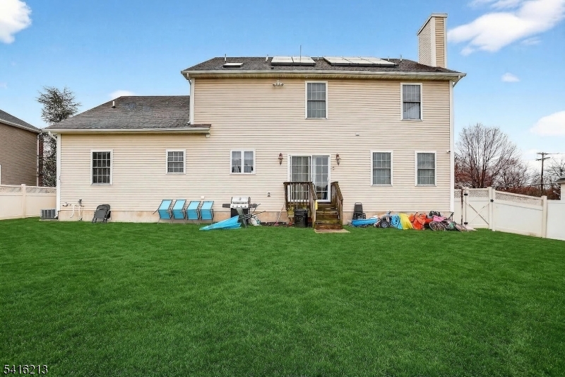 127 Churchill Avenue Somerset, NJ 08873 - Photo 5 of 33 a front view of house with yard