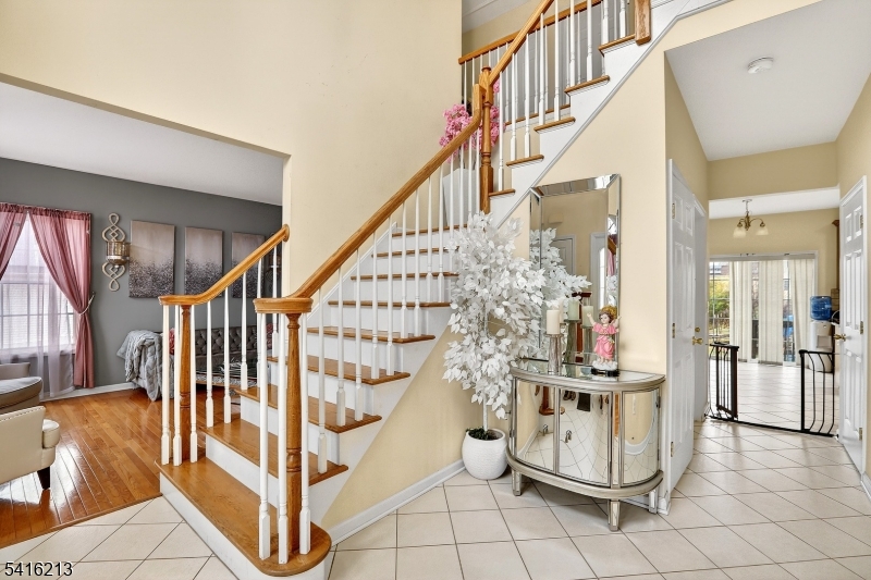 127 Churchill Avenue Somerset, NJ 08873 - Photo 10 of 33 a view of entryway with wooden floor