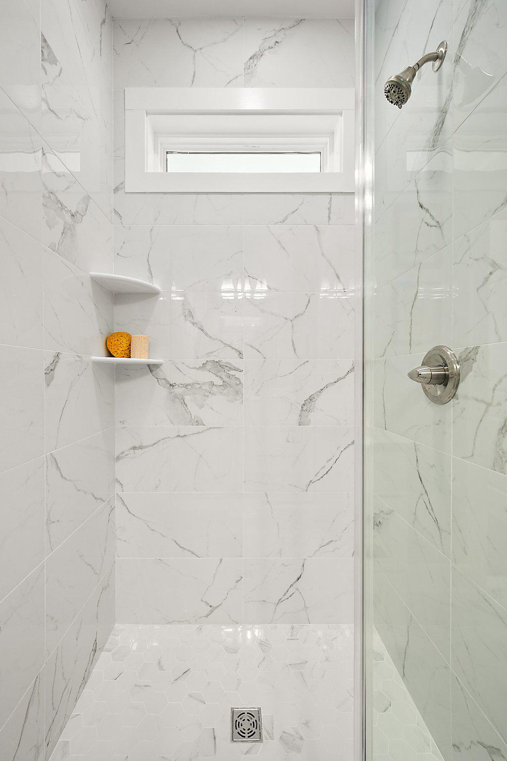 36047 Jackson Street Ocean View, DE 19970 - Photo 26 of 50 Sleek tile shower oasis w/glass shower door