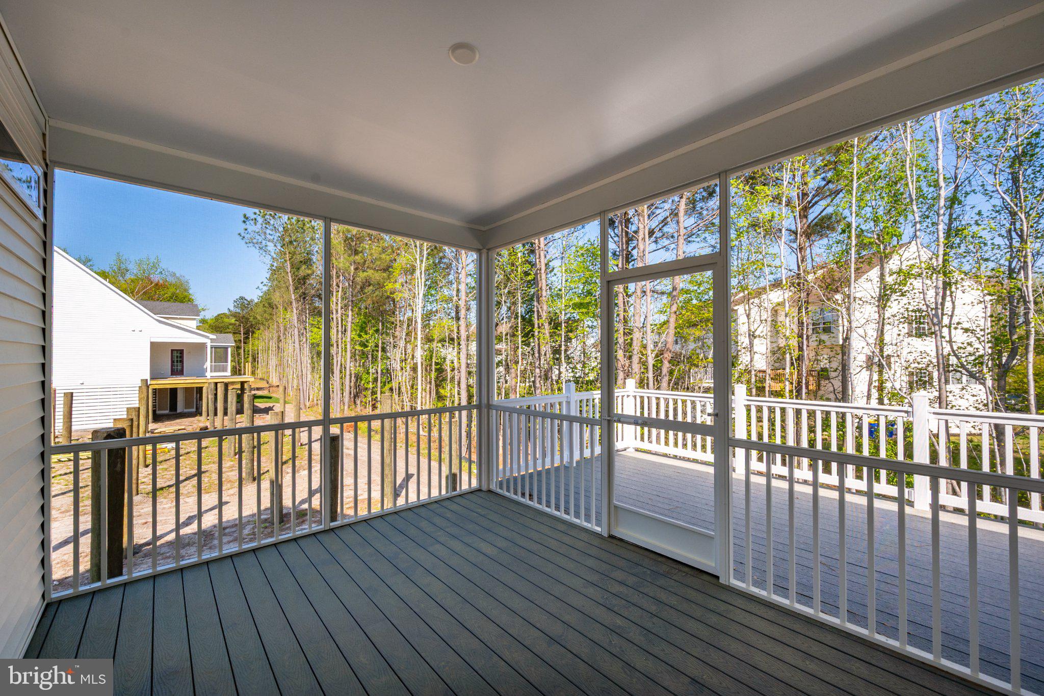 36047 Jackson Street Ocean View, DE 19970 - Photo 36 of 50 Serene screened porch with nature views.