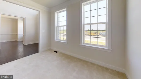 an empty room with windows