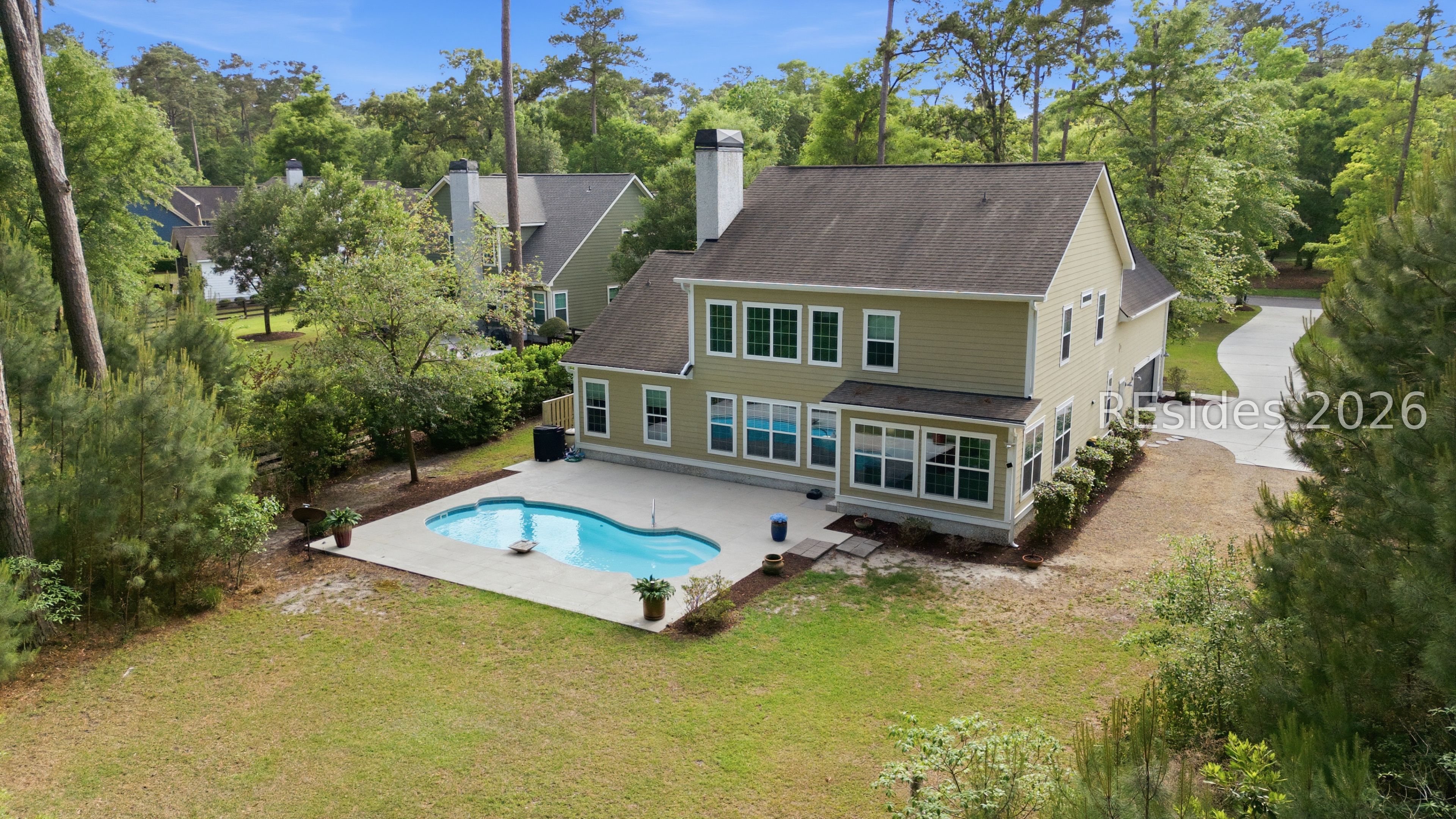 16 Dove Tree Lane Bluffton, SC 29910 - Photo 4 of 30 Airial of home from backyard