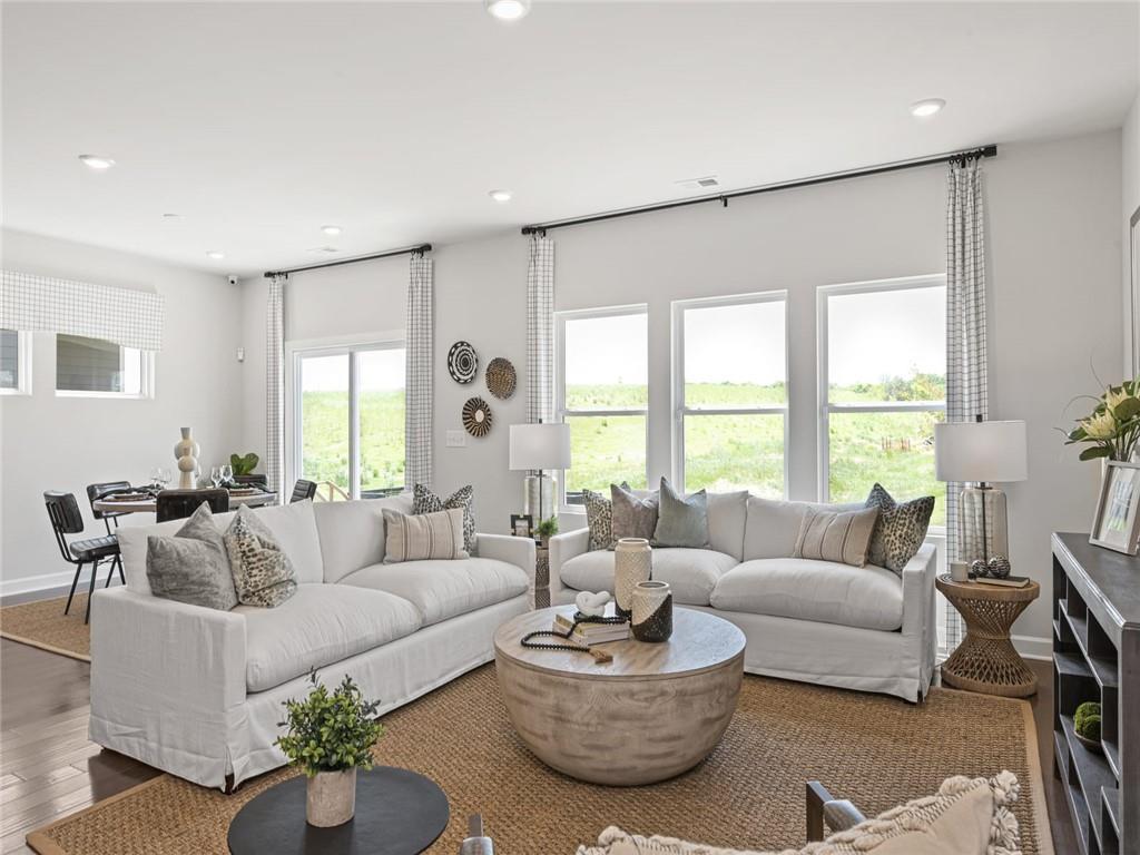 1478 High Fls Lane Grayson, GA 30017 - Photo 6 of 15 a living room with furniture and a large window