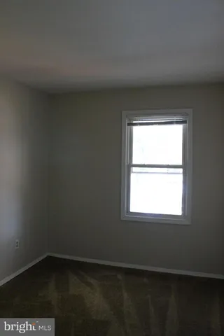 a view of a small space with a window