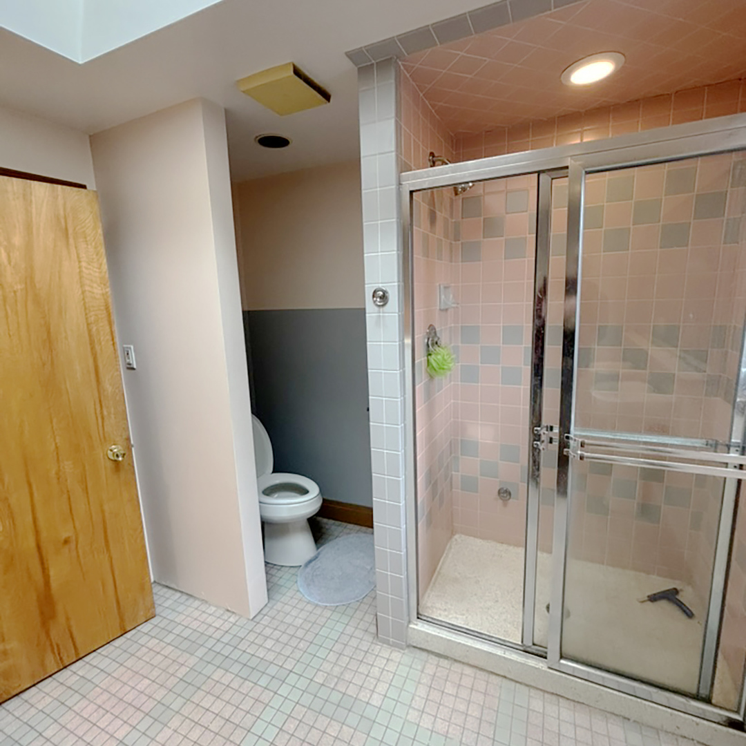 2133 West Grace Street, Unit 2 Chicago, IL 60618 - Photo 13 of 22 a bathroom with a granite countertop shower a toilet and a sink