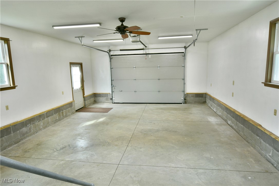 5150 Phillips Rice Road Cortland, OH 44410 - Photo 46 of 50 Garage featuring a wainscoted wall