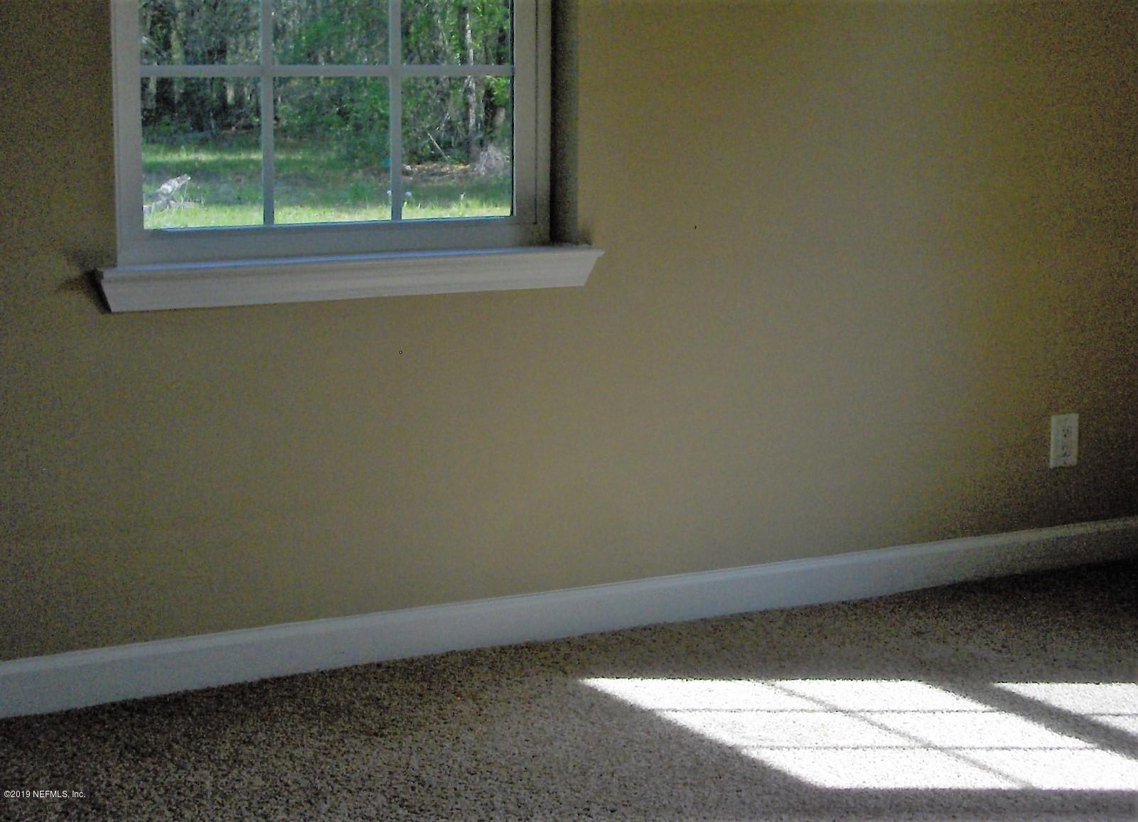 4122 Appaloosa Road Middleburg, FL 32068 - Photo 14 of 18 a view of a small space with window