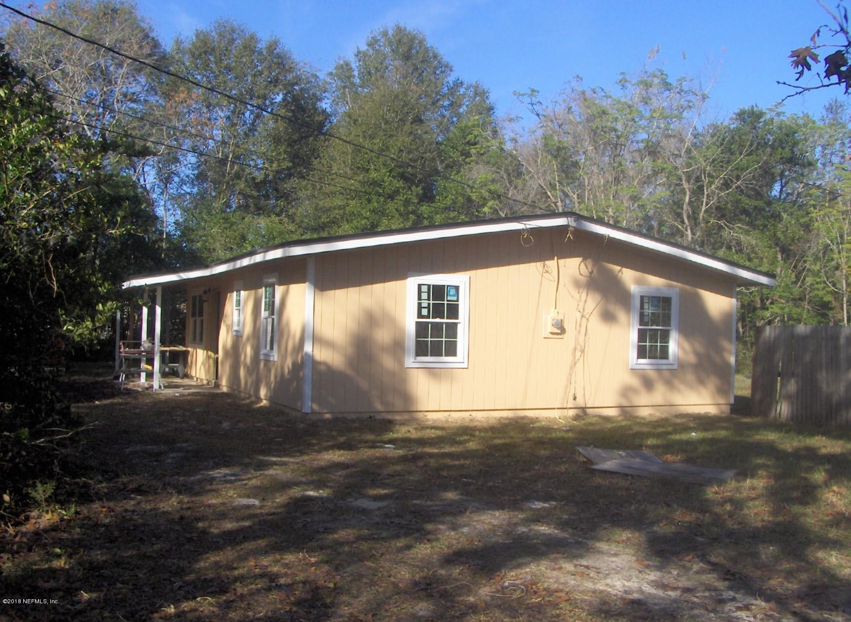 4122 Appaloosa Road Middleburg, FL 32068 - Photo 8 of 18 a view of a house with a yard