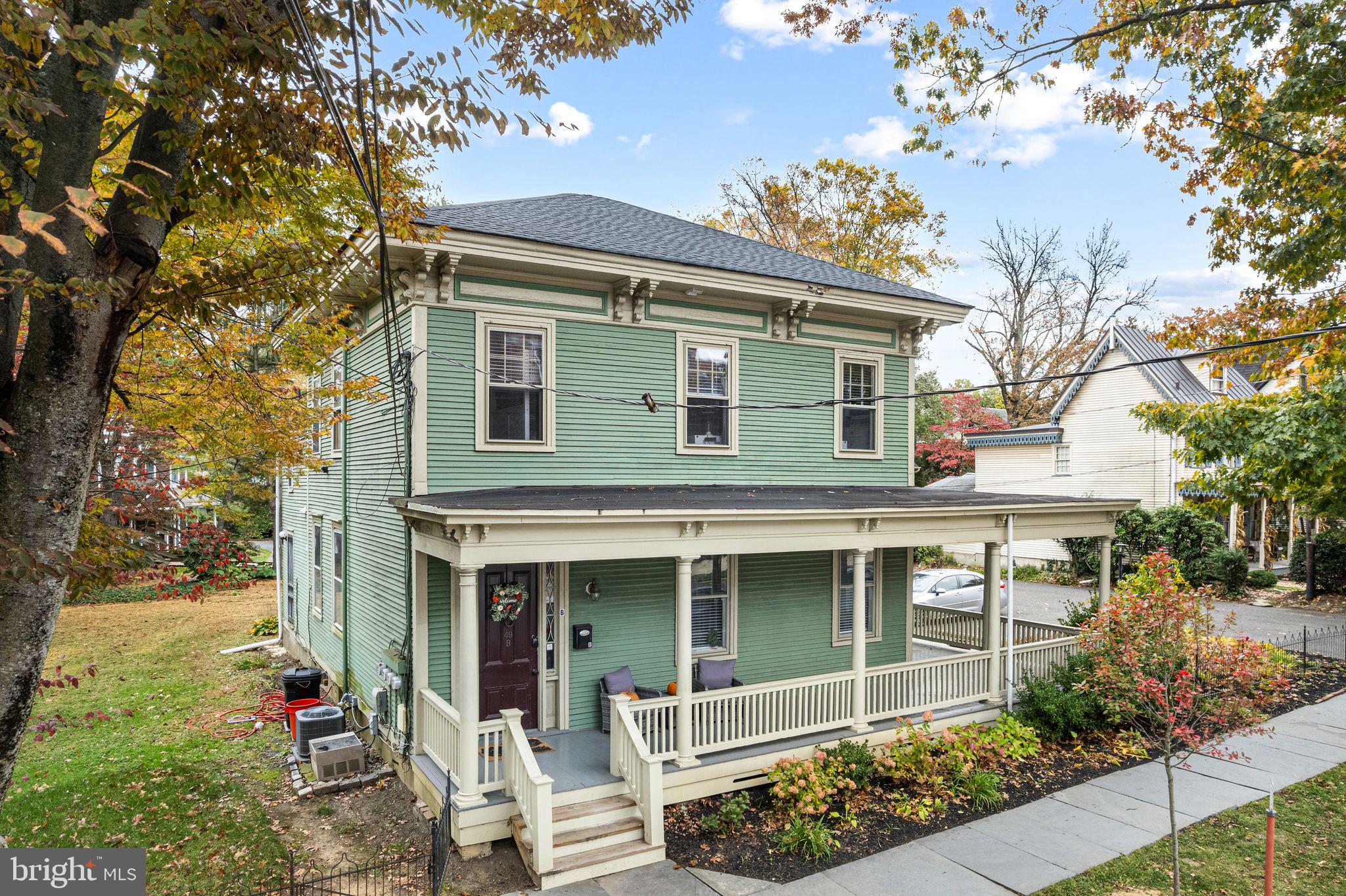 49 B Chestnut Street Haddonfield, NJ 08033 - Photo 14 of 19 front view of a house with a garden