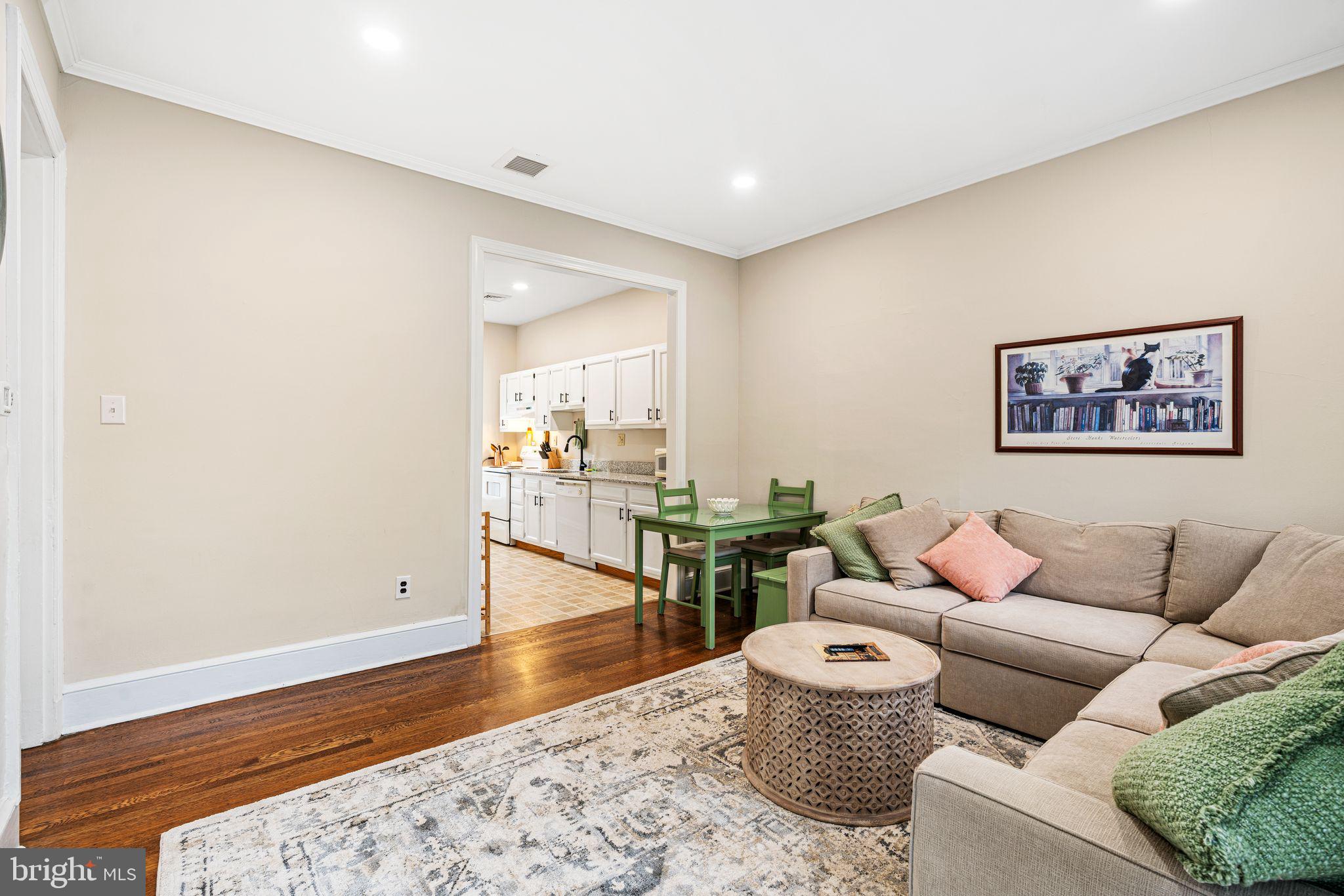 49 B Chestnut Street Haddonfield, NJ 08033 - Photo 4 of 19 a living room with furniture and a wooden floor