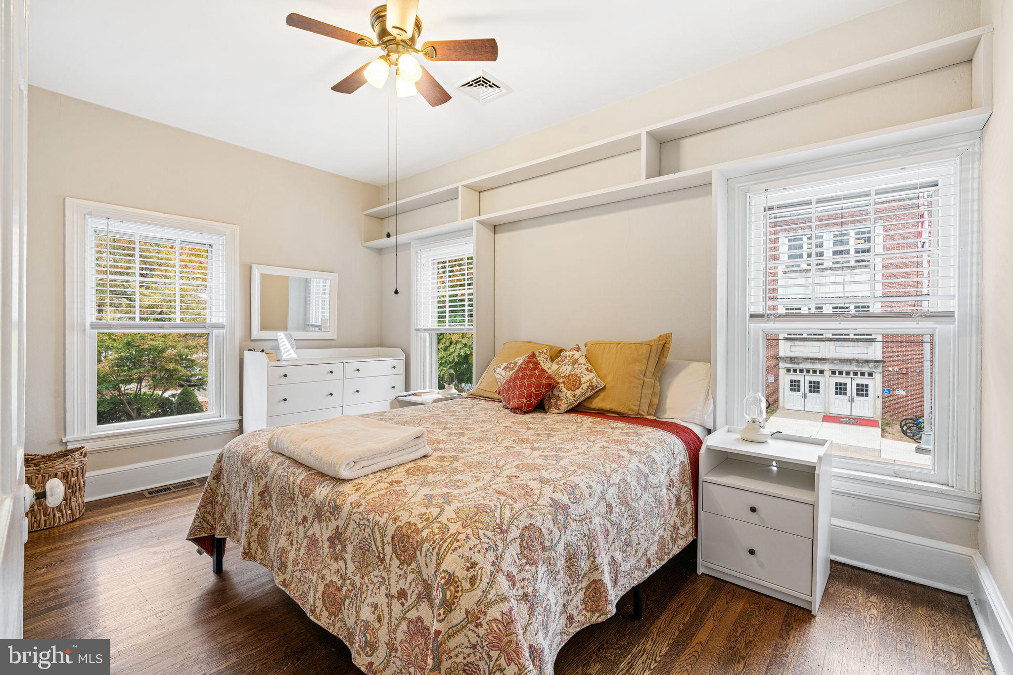 49 B Chestnut Street Haddonfield, NJ 08033 - Photo 5 of 19 a spacious bedroom with a bed and a window