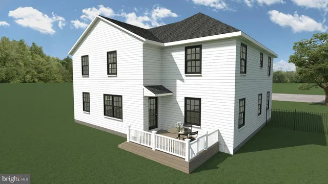 a view of a house with backyard and garden