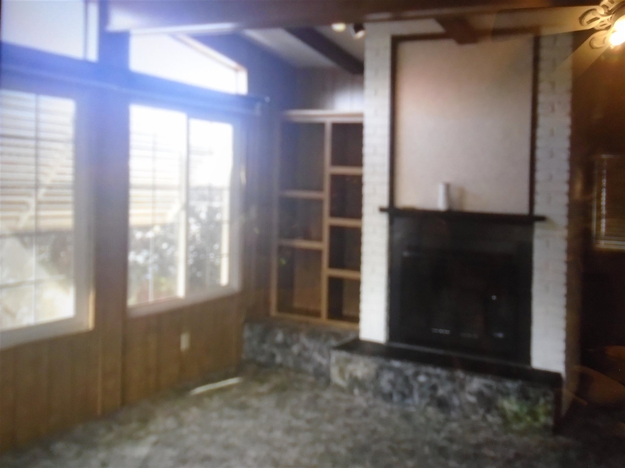 1200 South Carpenter Road, Unit 121 Modesto, CA 95351 - Photo 9 of 35 an empty room with windows