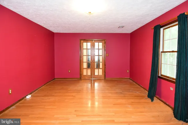 a view of an empty room with window