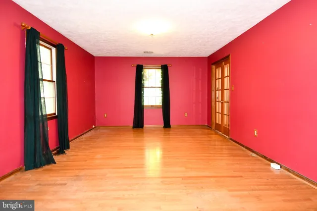 a view of an empty room with window