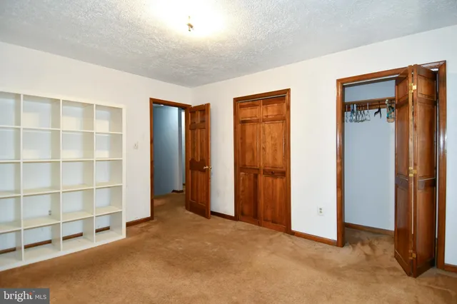 an empty room with closet
