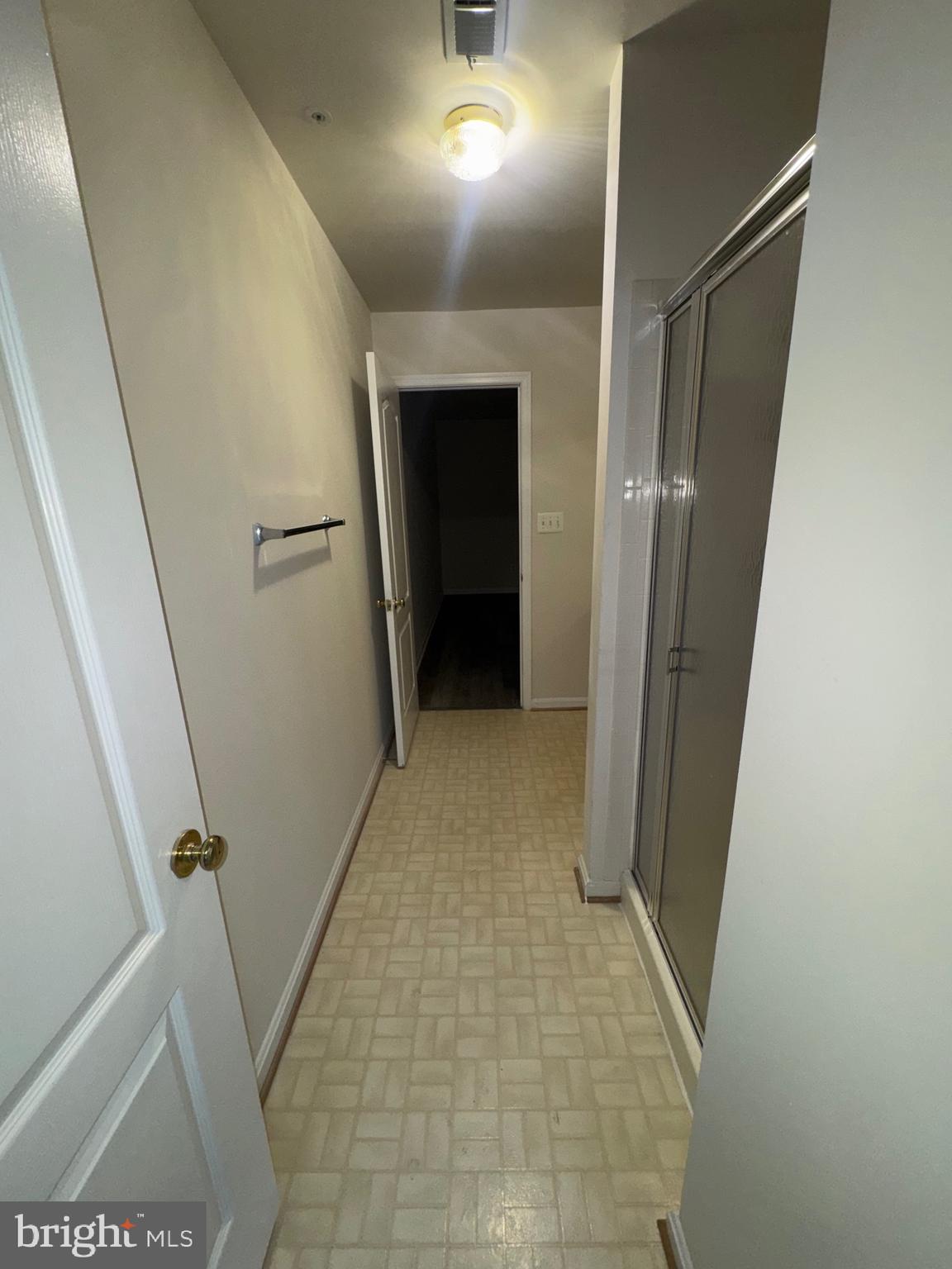 7705 Periwinkle Way, Unit 71 Severn, MD 21144 - Photo 5 of 28 a view of a hallway