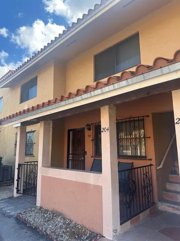 a view of a house with a balcony