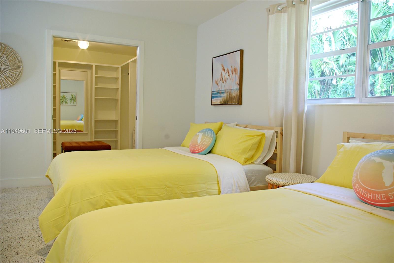 29450 Southwest 180th Avenue Homestead, FL 33030 - Photo 13 of 32 a bedroom with a bed and a window