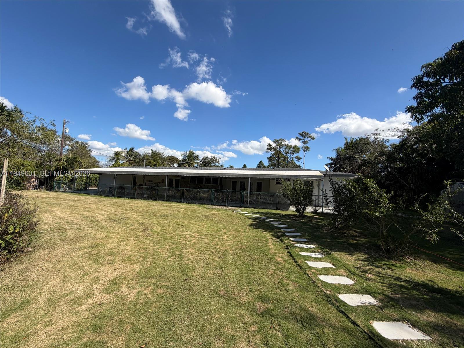 29450 Southwest 180th Avenue Homestead, FL 33030 - Photo 24 of 32 a view of swimming pool yard