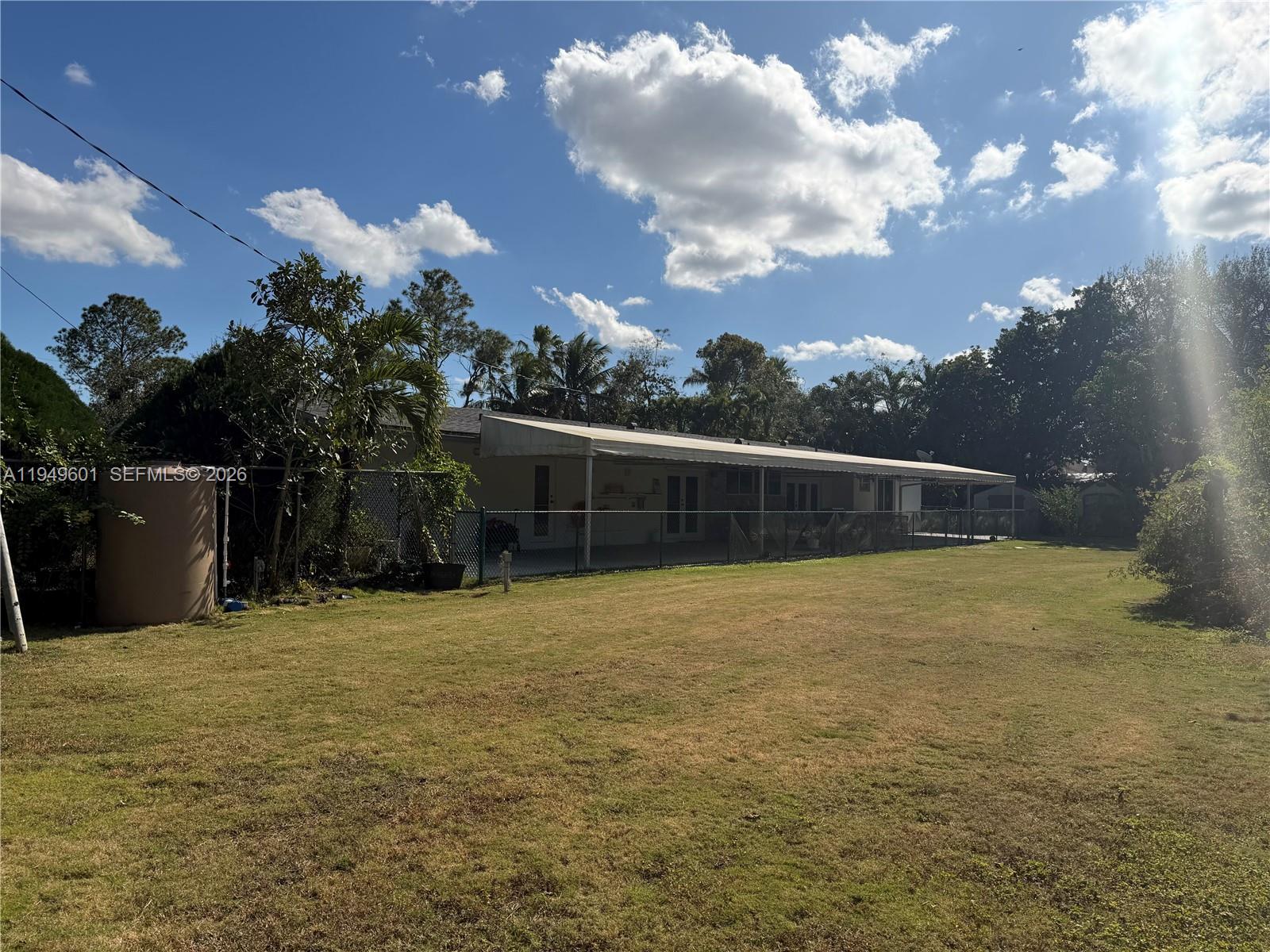 29450 Southwest 180th Avenue Homestead, FL 33030 - Photo 25 of 32 a view of an outdoor space and yard