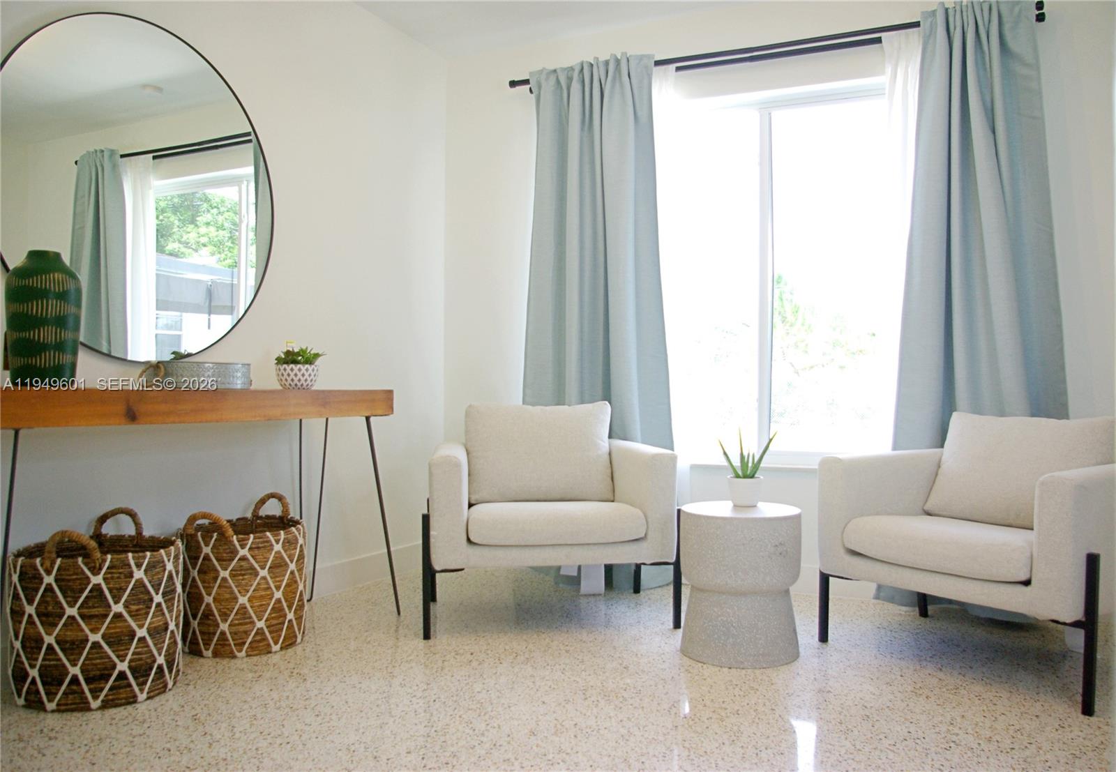 29450 Southwest 180th Avenue Homestead, FL 33030 - Photo 3 of 32 a living room with furniture and a large window
