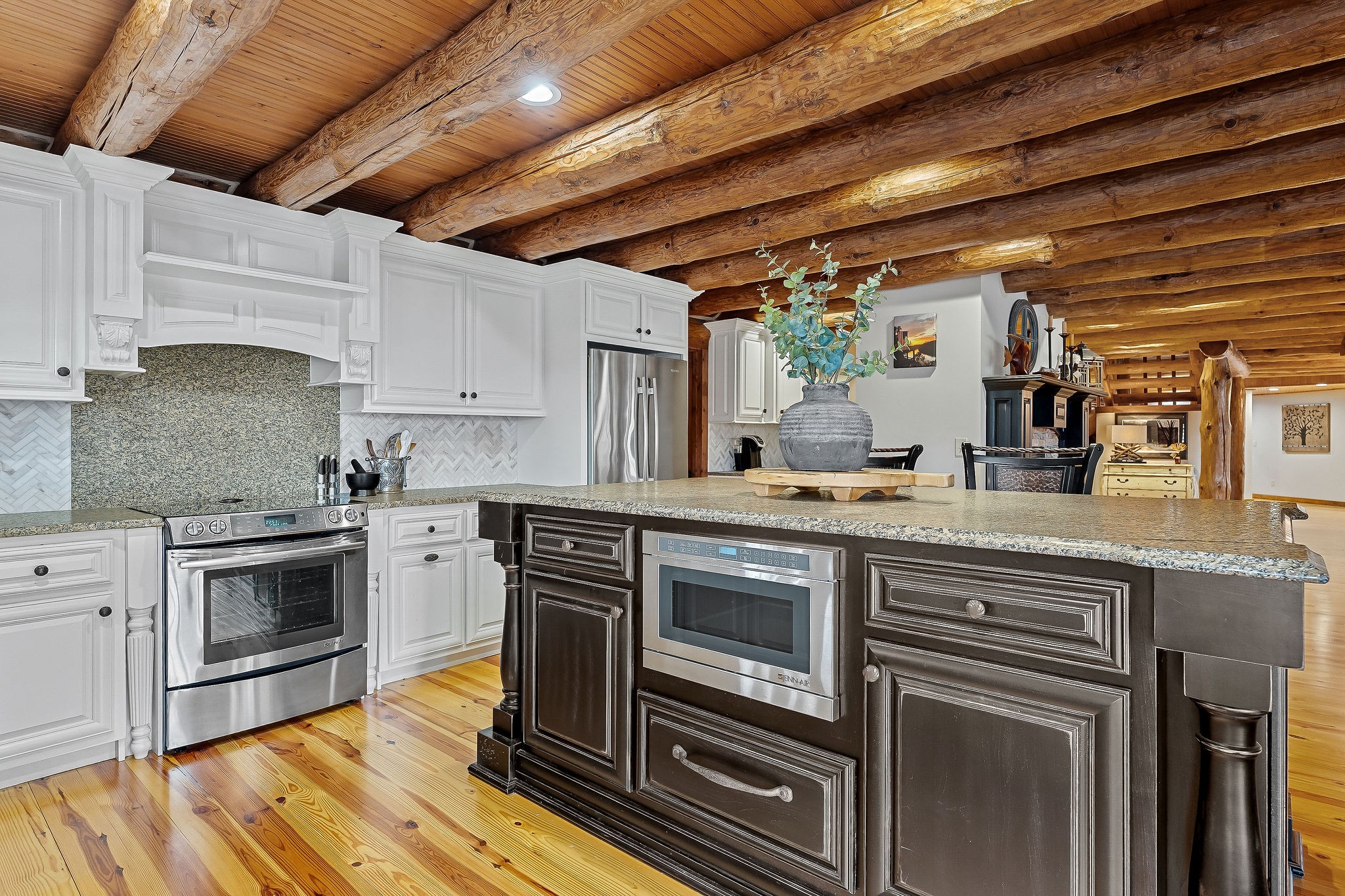 562 Rocky Ridge Road East Rock Island, TN 38581 - Photo 23 of 69 a kitchen with stainless steel appliances granite countertop a stove and a sink