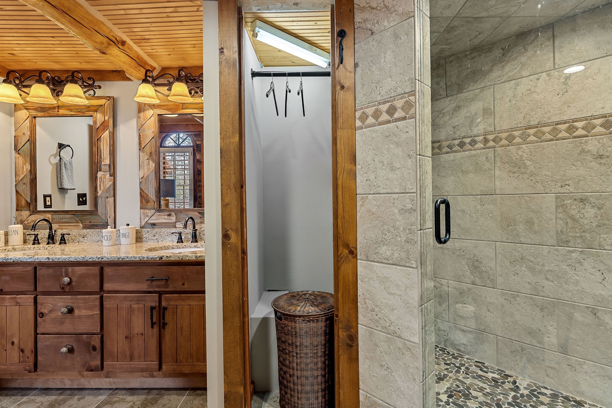 562 Rocky Ridge Road East Rock Island, TN 38581 - Photo 45 of 69 a bathroom with a granite countertop sink a toilet and shower