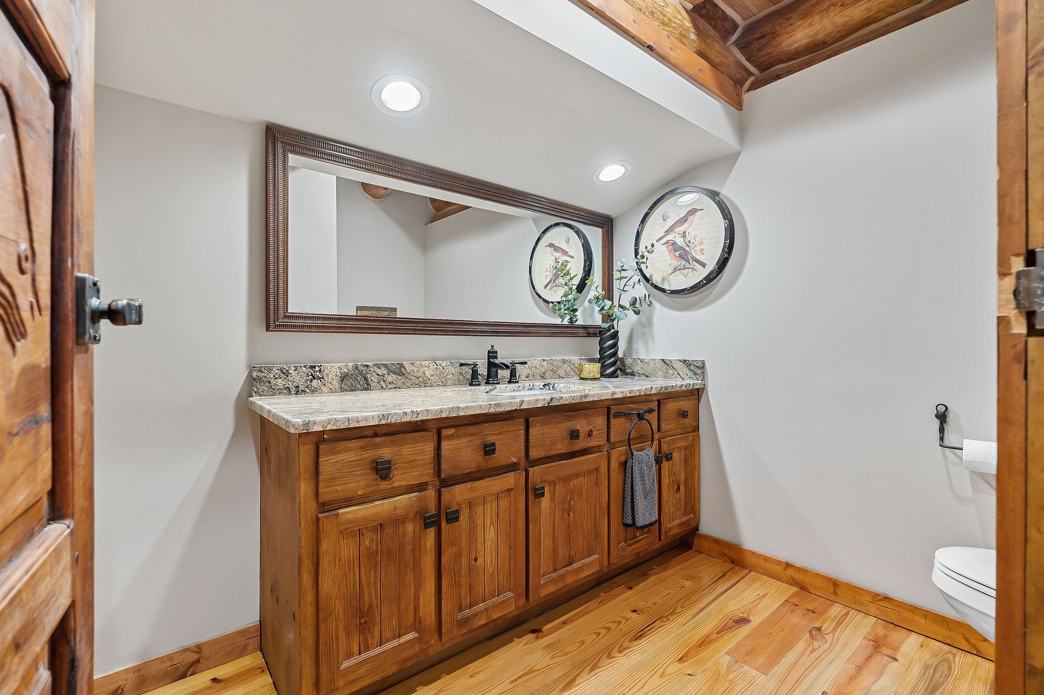562 Rocky Ridge Road East Rock Island, TN 38581 - Photo 49 of 69 a bathroom with a sink and a mirror