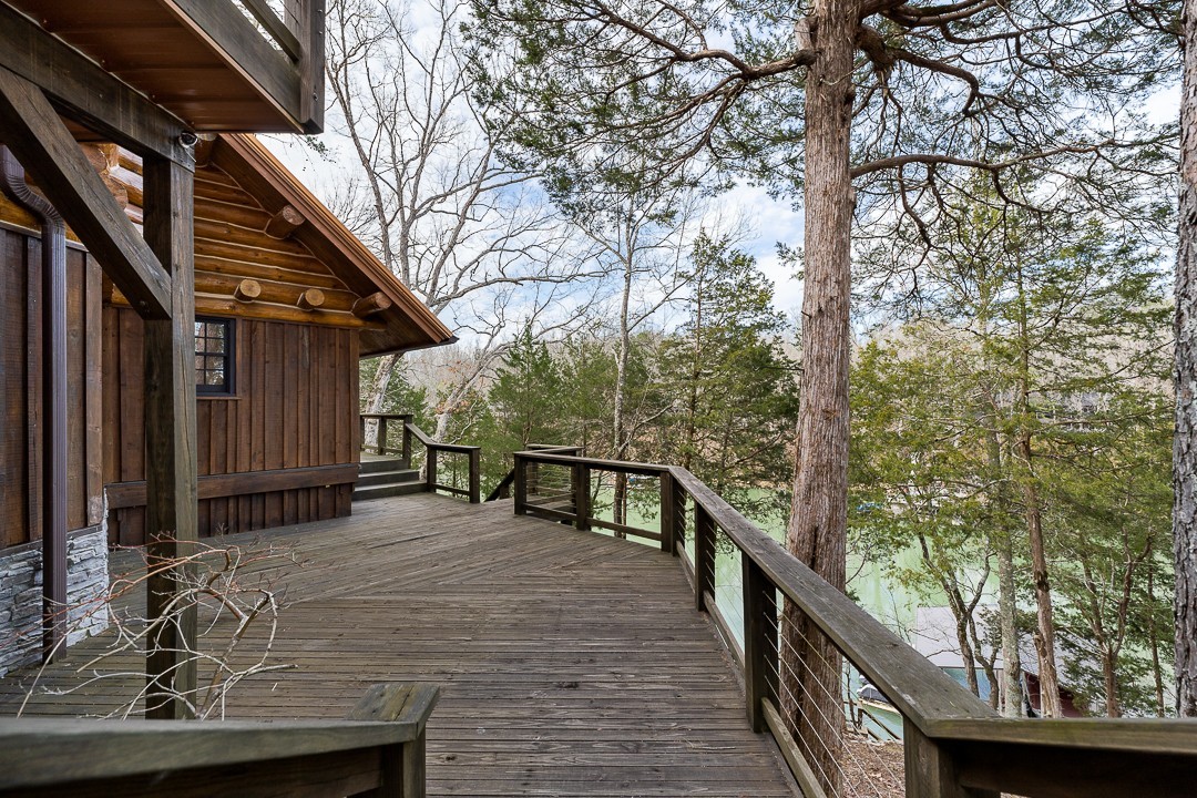 562 Rocky Ridge Road East Rock Island, TN 38581 - Photo 56 of 69 a view of a wooden deck and a backyard