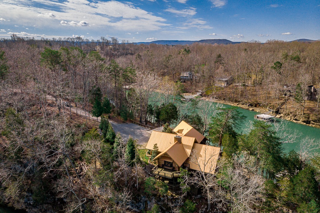 562 Rocky Ridge Road East Rock Island, TN 38581 - Photo 10 of 69 an aerial view of a house with a yard