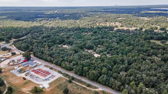 a view of a yard with an ocean