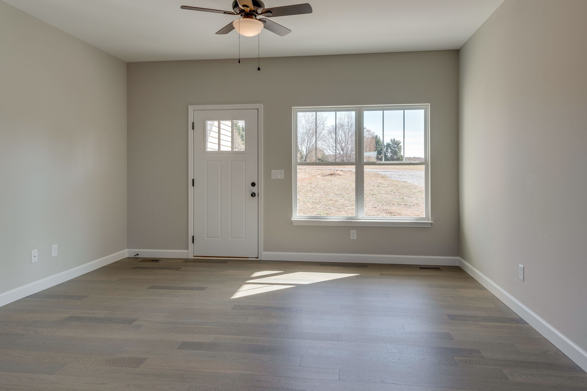 541 Murrell Road Dickson, TN 37055 - Photo 4 of 25 a view of an empty room with a window