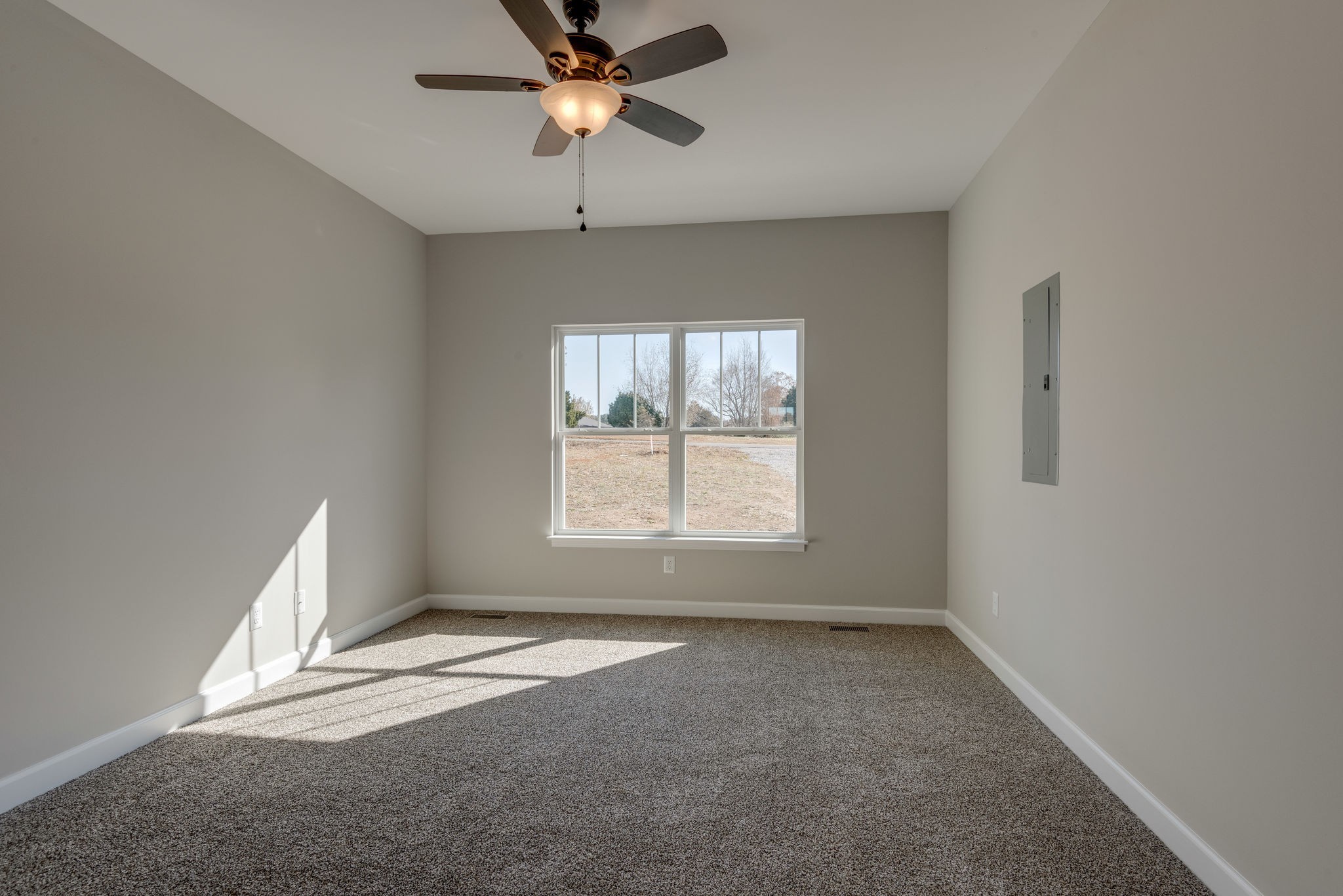 541 Murrell Road Dickson, TN 37055 - Photo 10 of 25 an empty room with a window and a fan