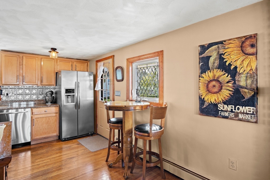 4 Jeffrey Road Billerica, MA 01821 - Photo 13 of 34 a kitchen with stainless steel appliances a refrigerator and a stove top oven