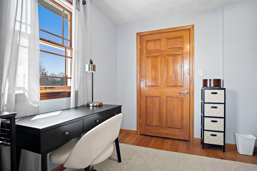 4 Jeffrey Road Billerica, MA 01821 - Photo 26 of 34 a living room with furniture and wooden floor