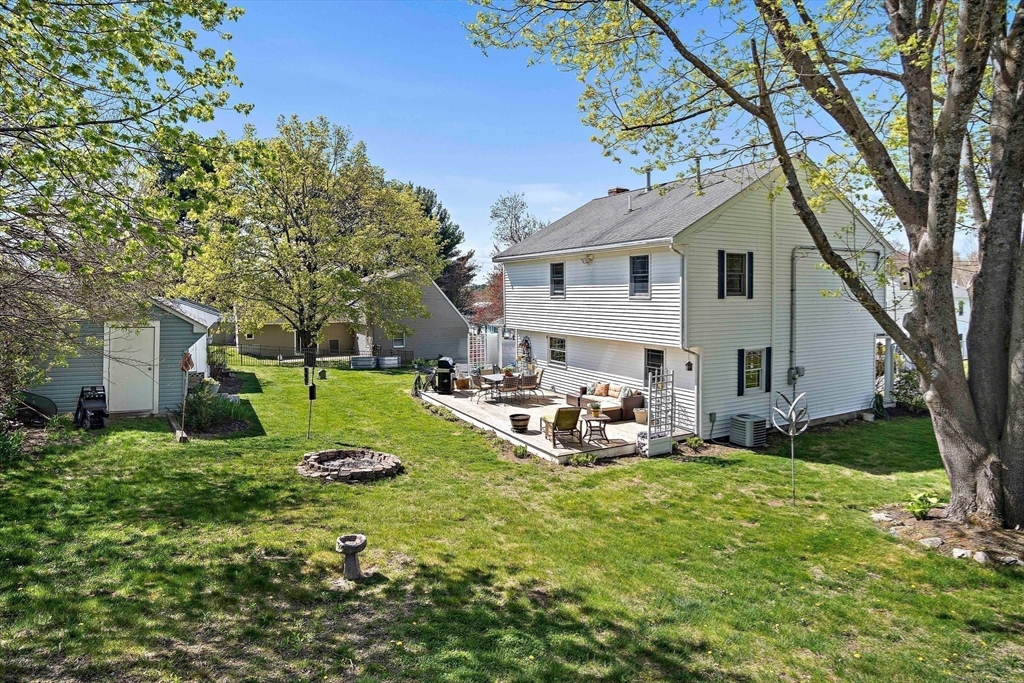 4 Jeffrey Road Billerica, MA 01821 - Photo 5 of 34 a view of a house with backyard