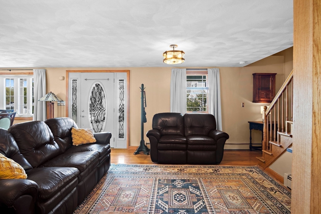 4 Jeffrey Road Billerica, MA 01821 - Photo 9 of 34 a living room with furniture and a windows