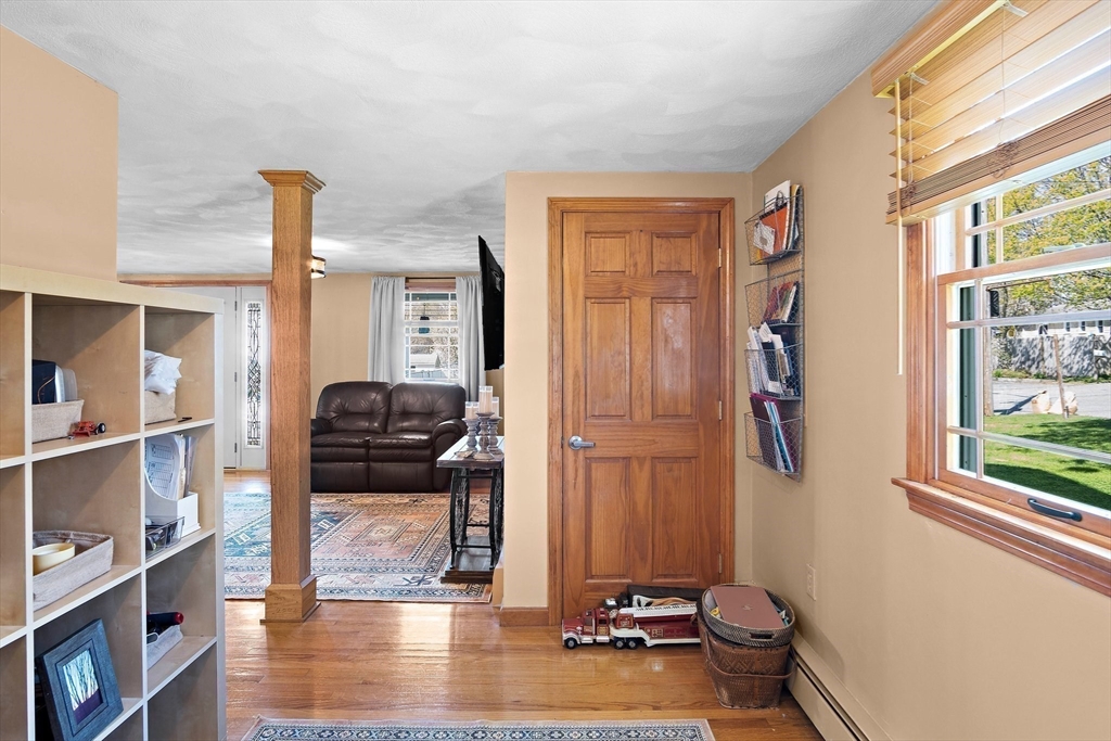 4 Jeffrey Road Billerica, MA 01821 - Photo 10 of 34 a view of a entryway with furniture and floor to ceiling window