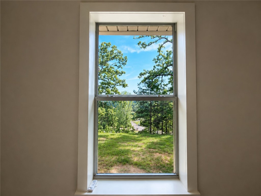 331 Channel Circle Russellville, AR 72802 - Photo 14 of 29 Bright double-hung window featuring white trim and a deep sill