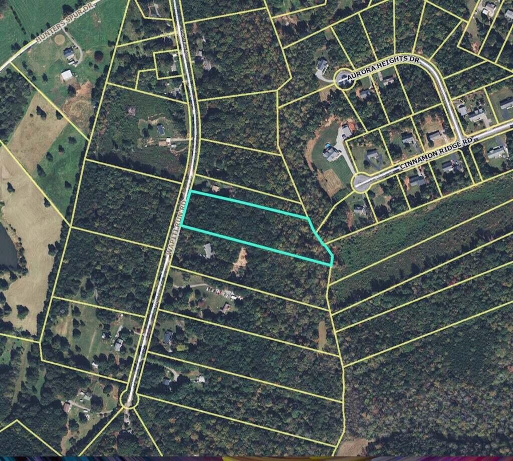 Lot 6 Wapiti Run Road Moneta, VA 24121 - Photo 6 of 7 a view of an empty room with wooden floor and windows